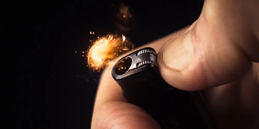 a bic lighter being lit