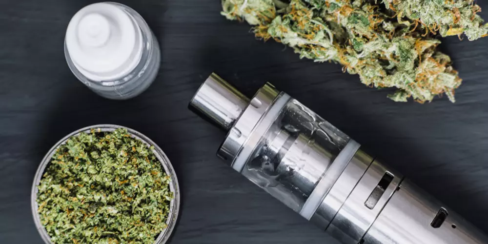 vape e-cigarette with grinder and cannabis