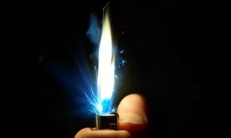 butane lighter showing flint burning